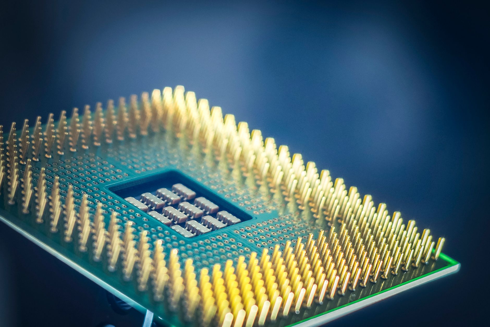 Close up view of advanced silicon computer processor chip on a modern motherboard.